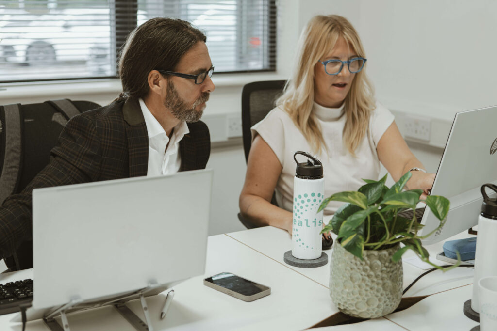 Claire McLean and David McLean In The Realise HR Office